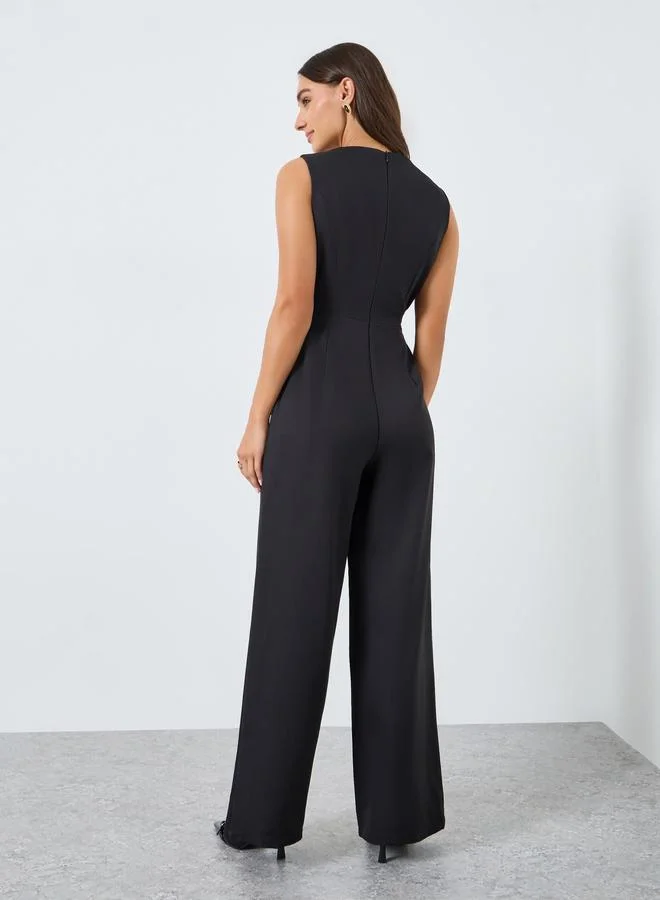 Styli  Women Sleeveless Asymmetric Jumpsuit with Fancy Buttons for Women | Best Price UAE